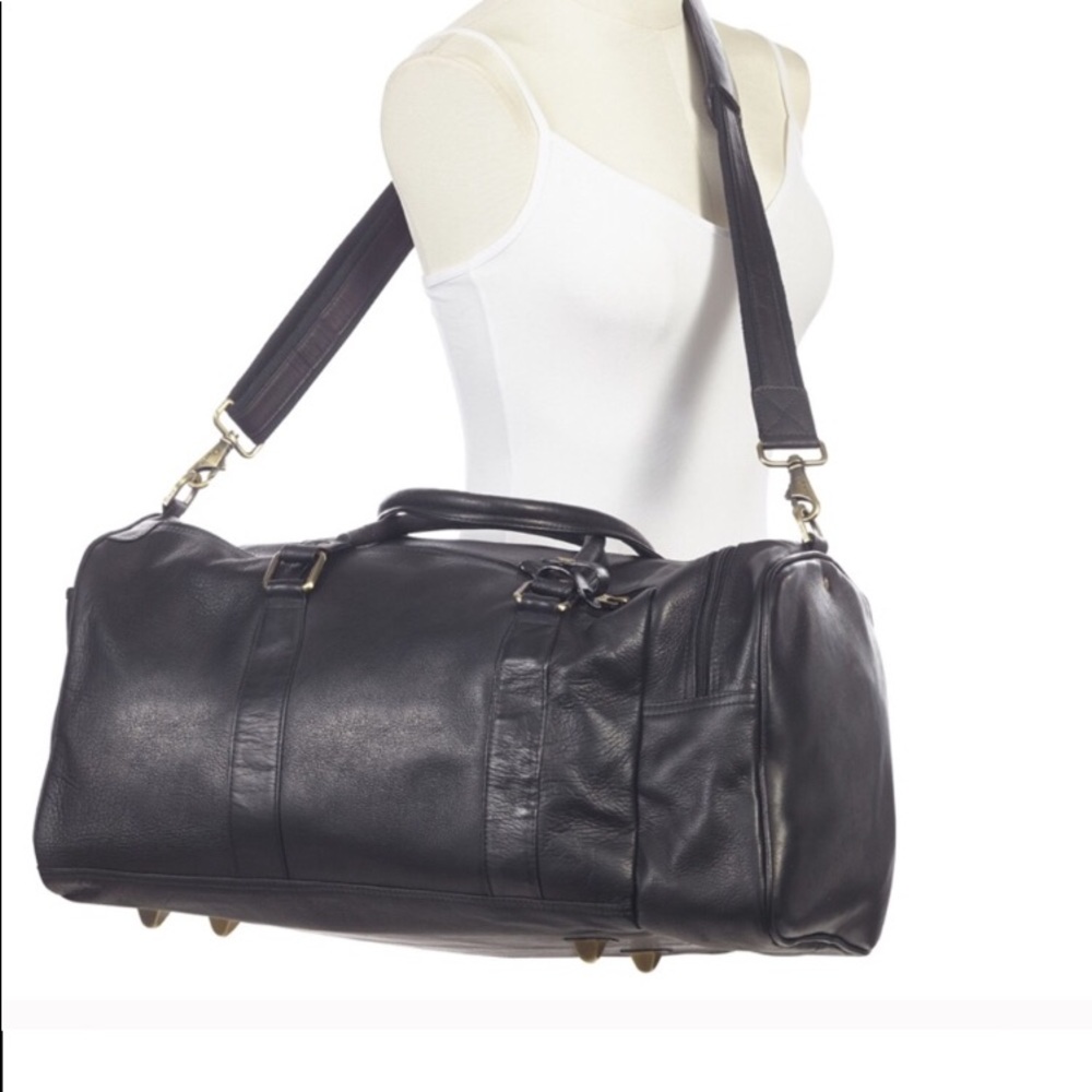 *SOLD” Clava leather side pocket duffel 20x10x10